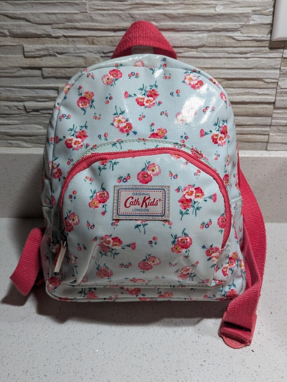 Cath Kidston Kids mini backpack with a delicate pink floral print.